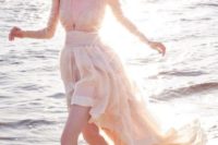 13 off-white high low wedding dress with a plunging neckline