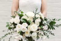 13 white and green bouquet of roses, ranunculus, ruscus, and salal