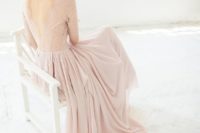 14 blush lace bodice with a V-back and a flowy skirt