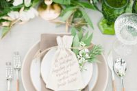 14 fresh neutral spring table setting with a lot of greenery and flowers