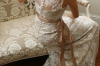 14 lace sheath wedding dress with an illusion button back