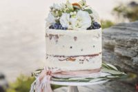 14 single tier wedding cake with flowers and berries for a summer wedding