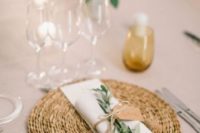 15 rustic neutral spring place setting with a rattan charger