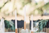 16 concrete candle holders with color block candles