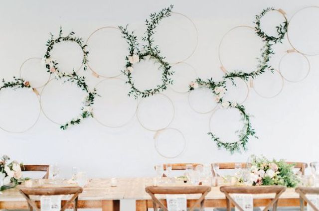 greenery and floral hoops for reception decor