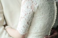 17 vintage-inspired wedding gown with half sleeves and pearl buttons