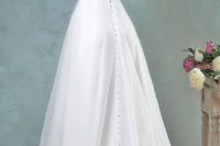 18 chic wedding dress with a lace back and jeweled buttons