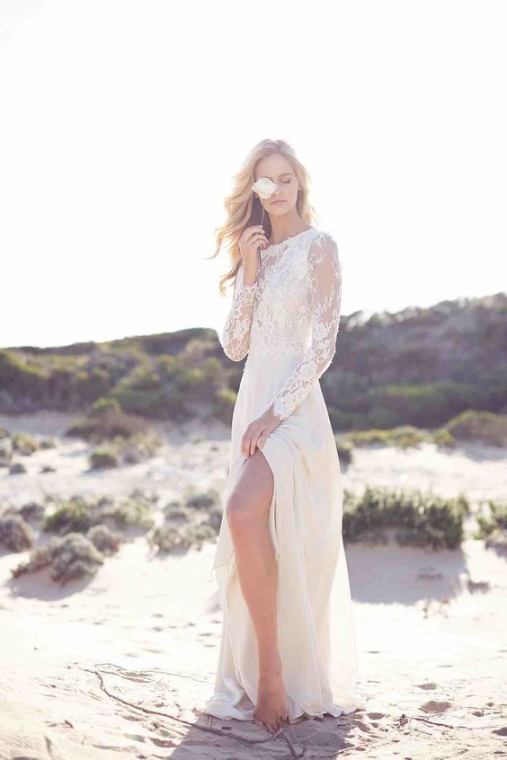 lace wedding dress with long sleeves and a side slit