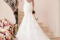 19 long-sleeved illusion back wedding dress with buttons on the back