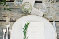 19 rustic spring table setting with fresh greenery and a wooden table