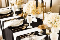 black, white and gold table setting