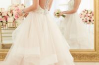 20 tulle layer ball gown with rhinestone detailing and buttons