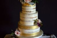 21 gold-brushed semi-naked wedding cake with flowers