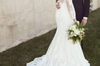 21 mermaid wedding dress with a lace button back and sleeves