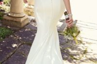 22 slinky wedding gown with a stunning rhinestone buttoned-down back