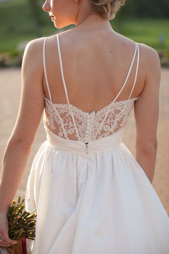 open back spaghetti strap wedding dress with some buttons