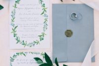 24 spring foliage invitation suite and a light blue envelope