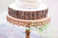 24 vintage cake stand with an additional wood slice and a semi-naked wedding cake
