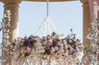 25 this pastel pink and purple floral chandelier is perfect for a lavish wedding