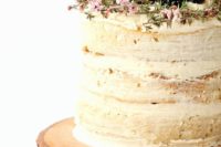 25 wood slice cake stand with a cup, a naked wedding cake with blackberries