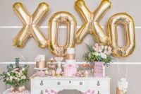 26 gold letter balloons and pink florals all over