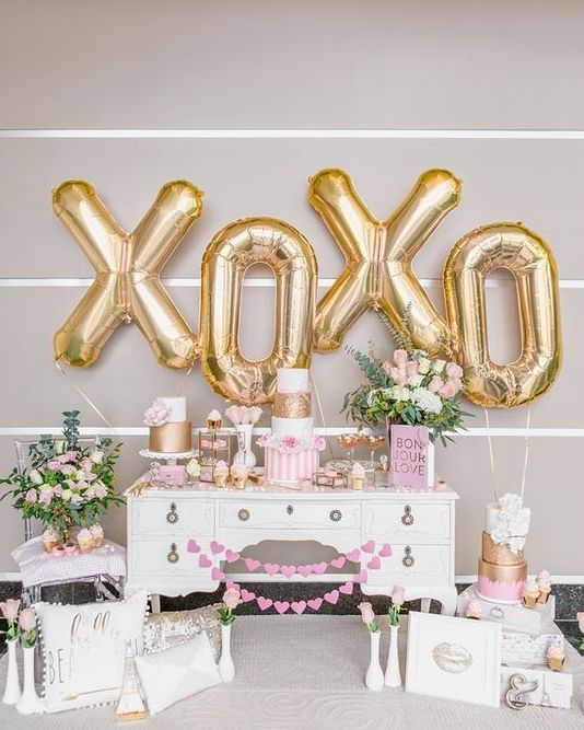 gold letter balloons and pink florals all over