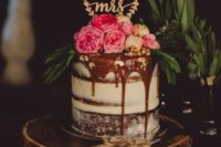 26 individual semi naked wedding cake with chocolate drip and fresh blooms