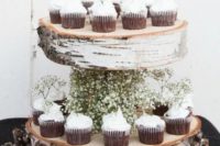 27 birch wood slice cupcake stand with baby’s breath