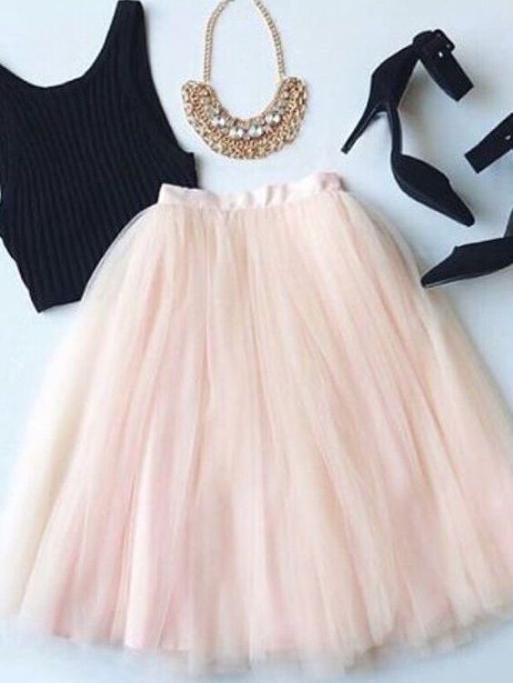 blush tulle skirt, black heels and a crop top