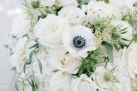 28 white and greenery wedding flower centerpiece