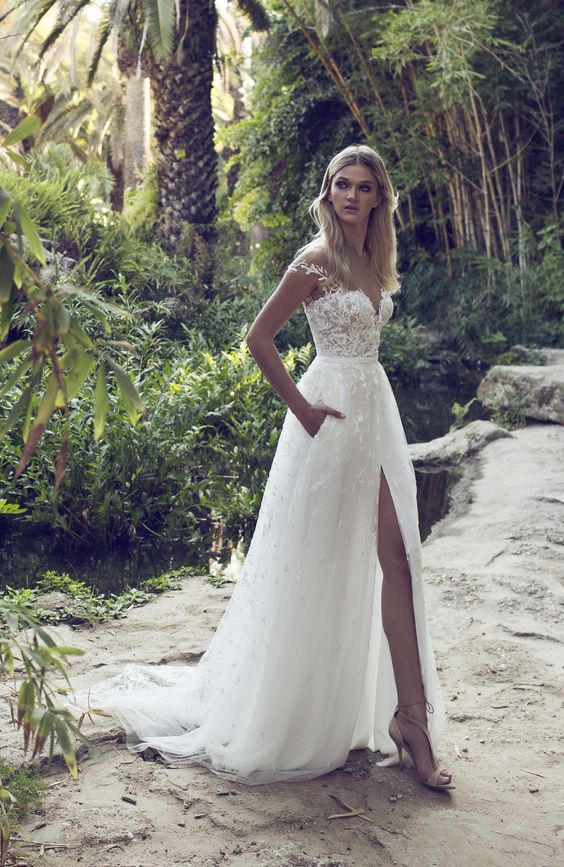 off the shoulder wedding dress with a high slit and pockets
