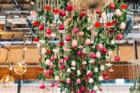 30 roses of various shades hanging from above look unique