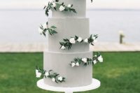 30 simple dive grey cake decorated with white flowers and greenery