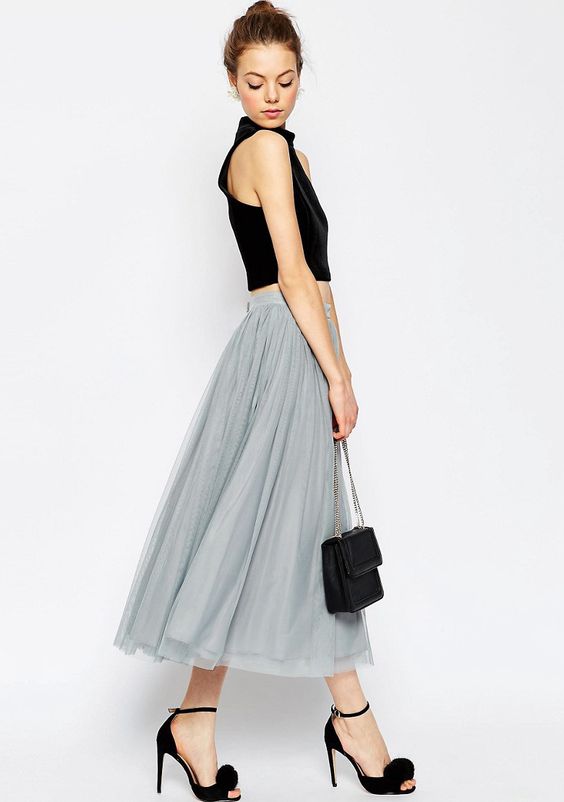 a dove grey tulle midi skirt and a black crop top