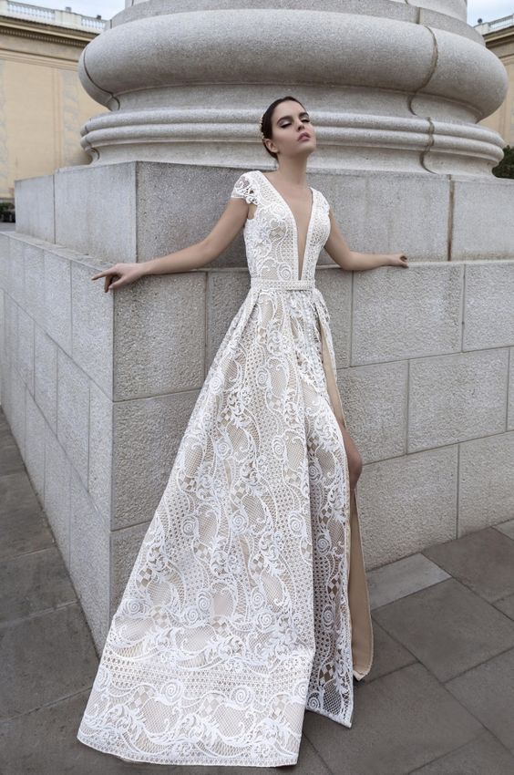 sleek plunging neckline lace embroidered wedding dress with a thigh-high slit