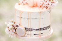 32 chocolate semi naked drip wedding cake with blush macarons and cherry blossom
