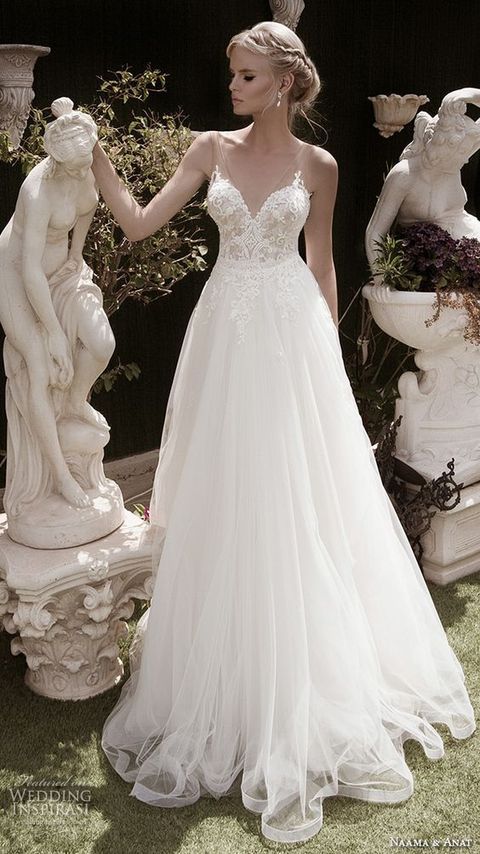 illusion V-neckline lace wedding dress with a flowy skirt