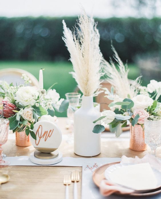 boho tablescape with pampas grass and copper details