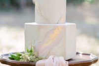 34 concrete marblelized wedding cake with fresh flowers on top