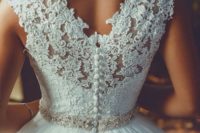 34 lace V-back wedding dress with fabric buttons