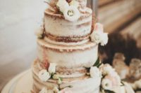 34 semi naked wedding cake with neutral florals looks rustic
