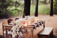 36 lush floral table runner transforms a rustic outdoor table