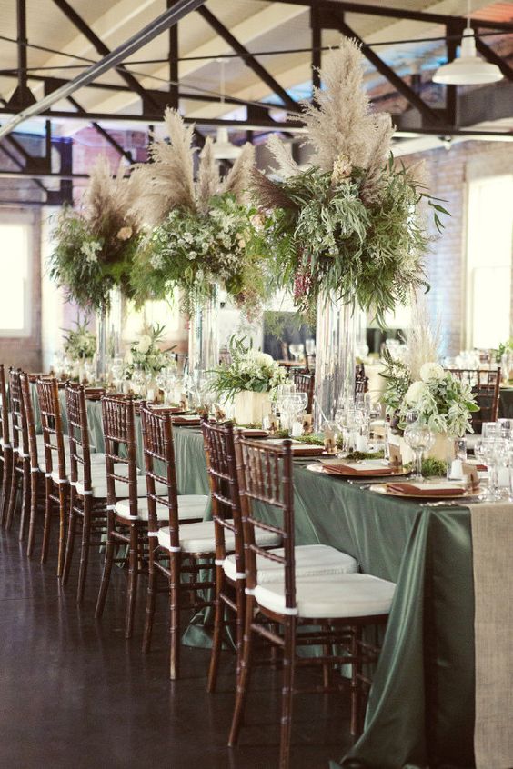 oversized tall vases with greenery and pampas for centerpiece