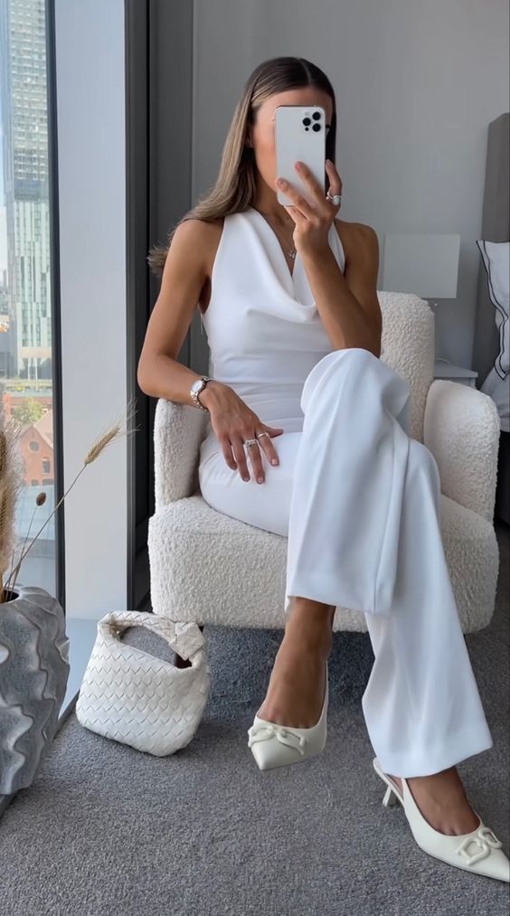 a casual bridal shower look with a cowl neck top, pants, creamy shoes and a small bag is amazing