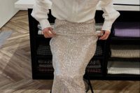 a classy pre-wedding party outfit with a white button down, a silver sequin maxi skirt, black shoes and a messy hairstyle