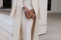 an elegant outfit with a midi strapless dress, a cover up, brown shoes with chain and a brown bag