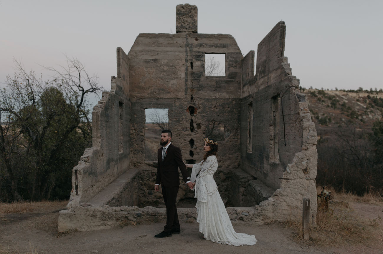 This dark and moody wedding shoot took place in castle ruins