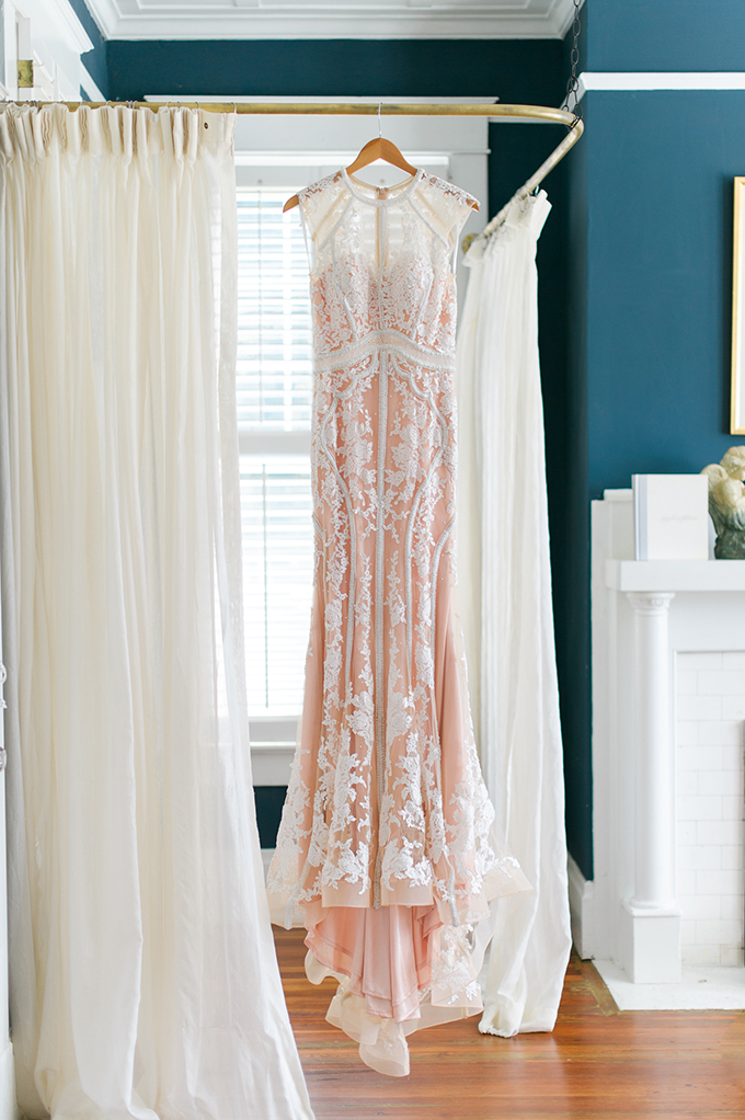 Enjoy this breathtaking blush wedding dress without sleeves with white lace appliques, it's just stunning