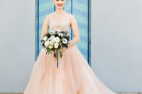 02 The bride was rocking a stunning blush wedding gown and looked aw-so-gorgeous