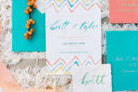 02 the adorable wedding stationary set was done in turquoise, orange and blue